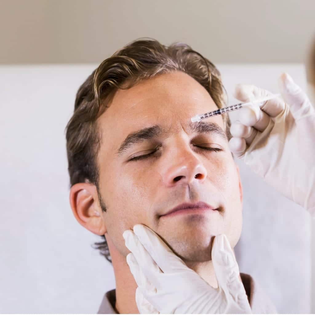 man getting botulinum toxin picture id514880097