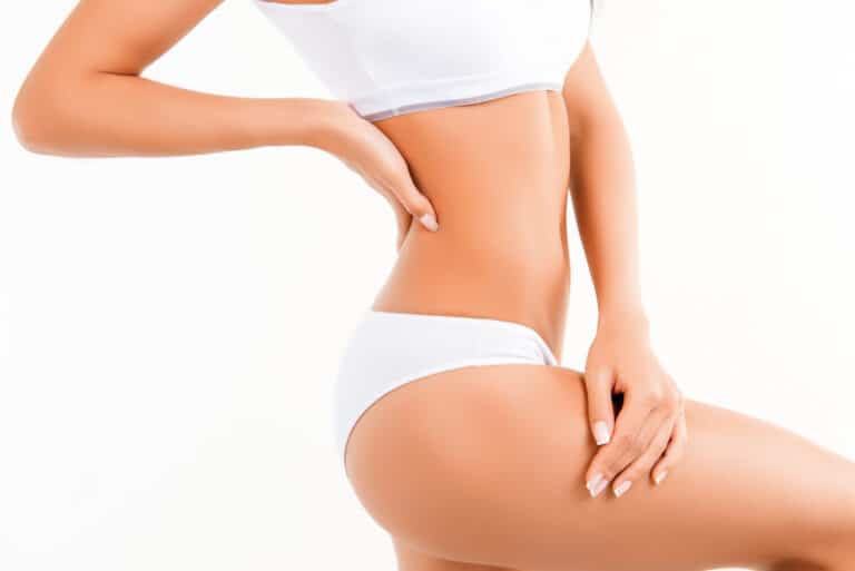 Woman's slim body contours after liposuction in Salt Lake City, UT