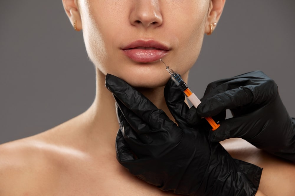 Woman getting lip filler in Salt Lake City, UT